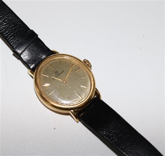 A ladys 18ct gold Bucherer manual wind wrist watch,